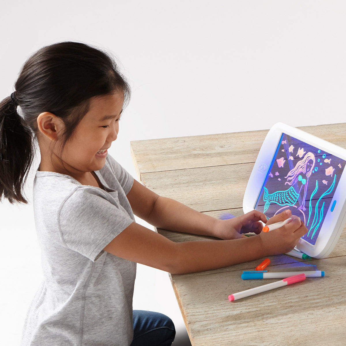 Discovery Neon Glow Drawing Easel with Markers
